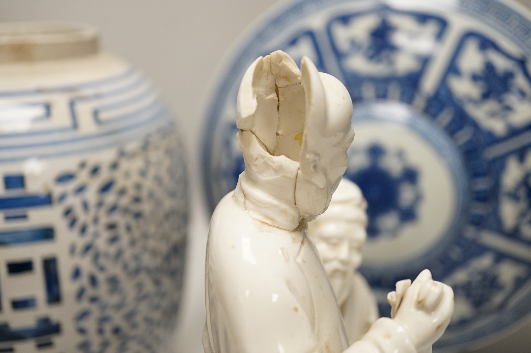 A Chinese blue and white two handled moonflask, together with another Chinese vase and Chinese figure group, tallest 36cm